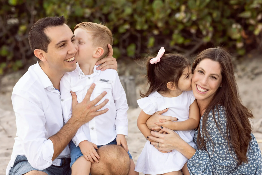 Dr. Yamila Garber from Glowing Smiles with her family